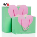 Heart-shaped high-end clothing gift handbag kraft paper bag